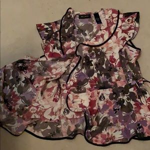 Blouse/top. Is adorable with a skirt.